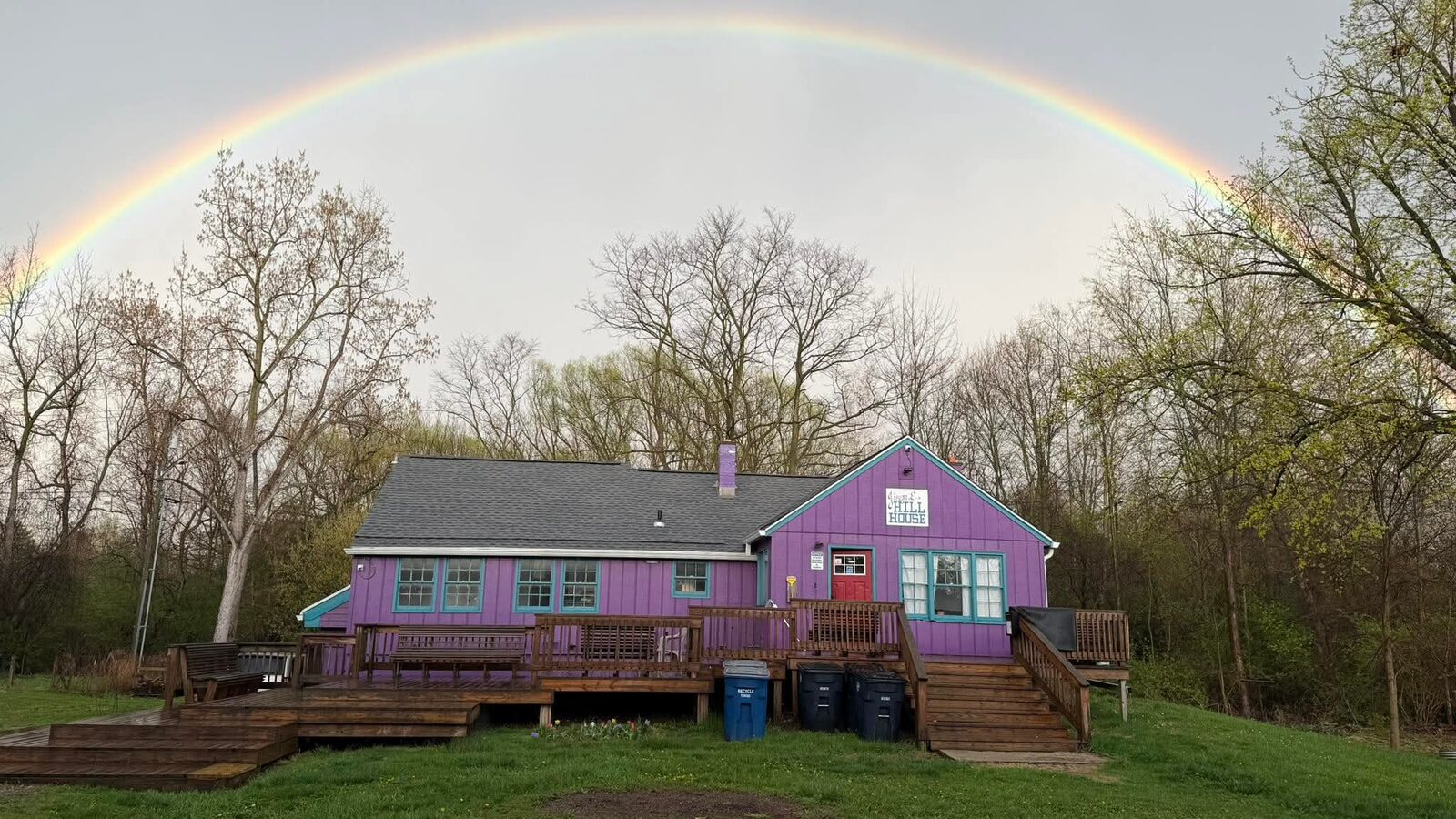 The Purple House under a rainbow